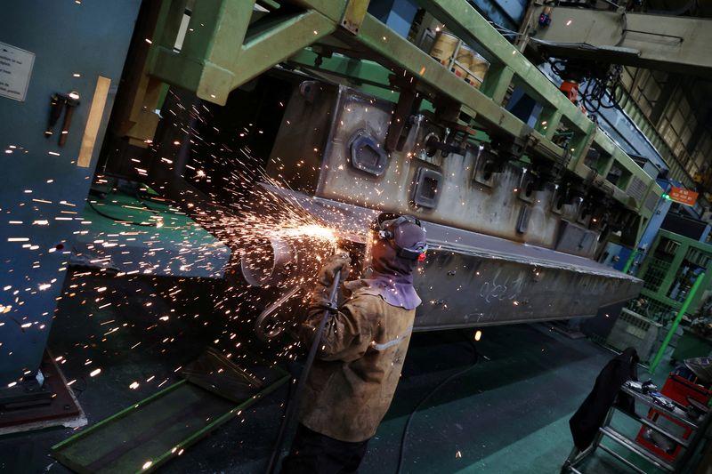 &copy; Reuters. A Hanwha Aerospace engineer works on a KAAV (Korean Amphibious Assault Vehicle) at Hanwha Aerospace factory in Changwon, South Korea, March 16, 2023.   REUTERS/Kim Hong-Ji/File photo