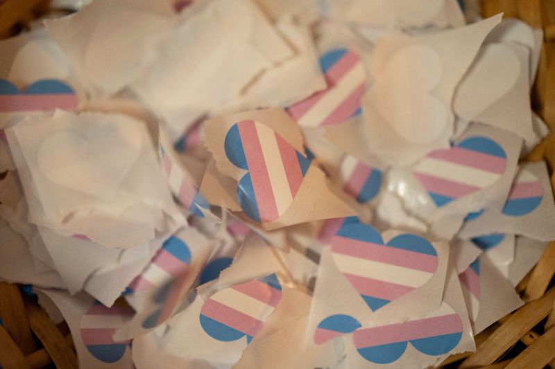 &copy; Reuters. Stickers in the shape of a heart with a trans flag are pictured during a conversation about trans care, equity and access, during National Trans Visibility Month with the Rainbow Room, a program of Planned Parenthood Keystone, in Doylestown, Pennsylvania,