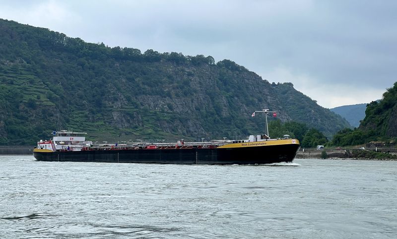 © Reuters. FILE PHOTO: A Dutch-made special tanker, built by shipping company Stolt Tankers, able to pass on the Rhine river even at low water levels which occur increasingly often due to global warming, sails past Bad Salzig on its way for a christening ceremony in Ludwigshafen, Germany, May 23, 2023. REUTERS/Stephane Nitschke/File Photo