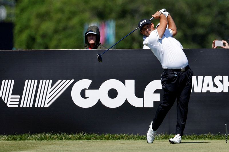 &copy; Reuters. FILE PHOTO: May 25, 2023; Washington, DC, USA; Patrick Reed hits his tee shot on the ninth hole during the Pro-Am tournament as part of the LIV Golf Washington D.C. 2023 event at Trump National Golf Club outside Washington DC. Mandatory Credit: Geoff Burk