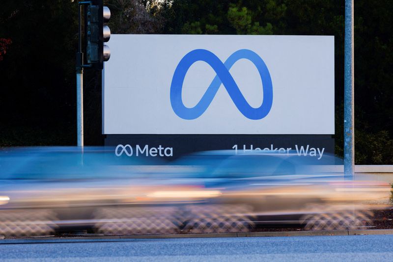 &copy; Reuters. FILE PHOTO: Morning commute traffic streams past the Meta sign outside the headquarters of Facebook parent company Meta Platforms Inc in Mountain View, California, U.S. November 9, 2022.  REUTERS/Peter DaSilva/File Photo