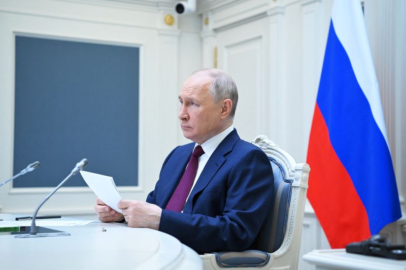 &copy; Reuters. الرئيس الروسي فلاديمير بوتين يحضر اجتماعا عن بعد لمنظمة شنغهاي للتعاون في موسكو يوم الثلاثاء. صورة لرويترز من وكالة سبوتنيك الروسية للأنبا