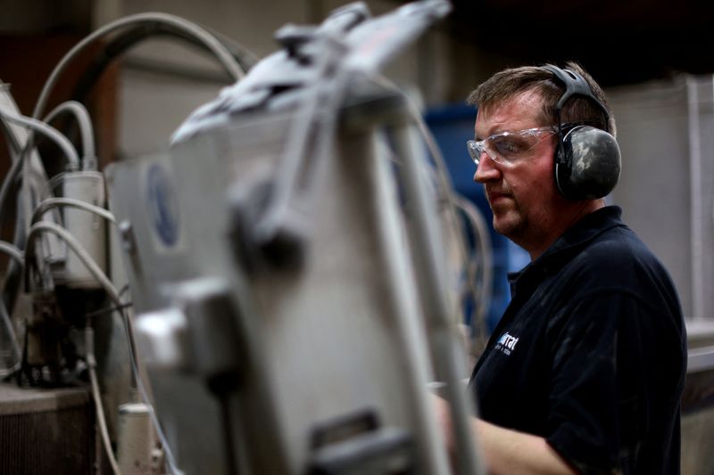 &copy; Reuters. FILE PHOTO: A man works in the Farrat factory in Altrincham, Britain, May 12, 2023. REUTERS/Carl Recine/File Photo