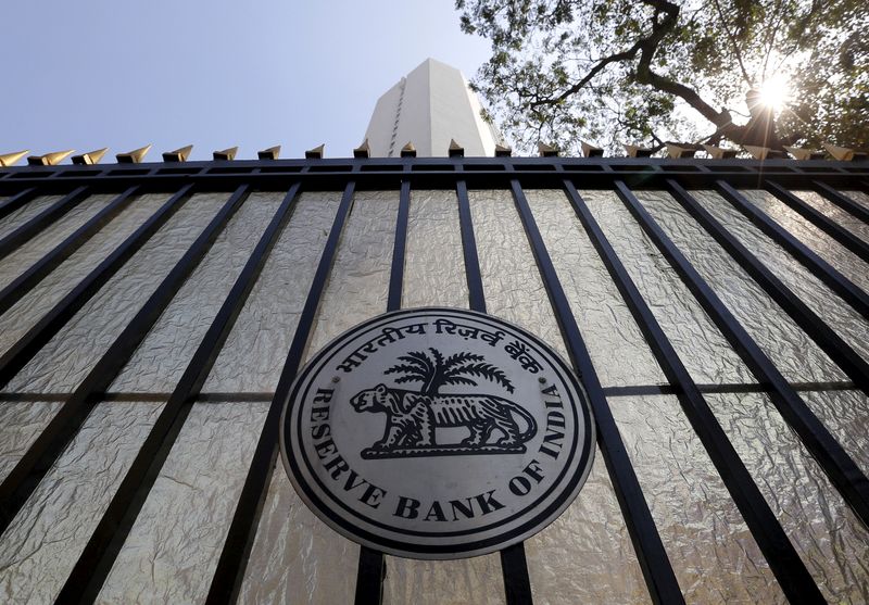 &copy; Reuters. FILE PHOTO: The Reserve Bank of India (RBI) seal is pictured on a gate outside the RBI headquarters in Mumbai, India, February 2, 2016. REUTERS/Danish Siddiqui/File Photo