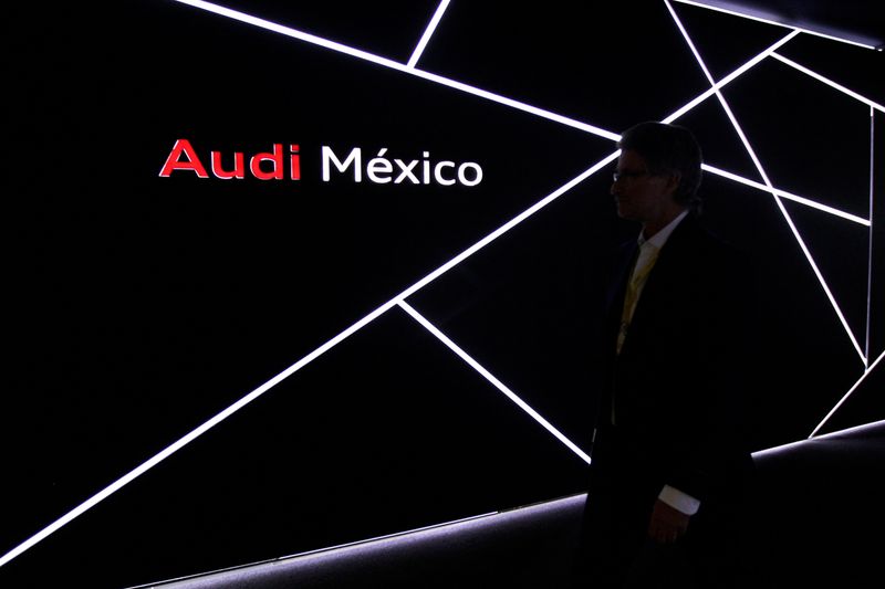 &copy; Reuters. FILE PHOTO: A man walks past the logo of Audi during the opening of a new plant in San Jose Chiapa, in Puebla state, Mexico, September 30, 2016. REUTERS/Imelda Medina