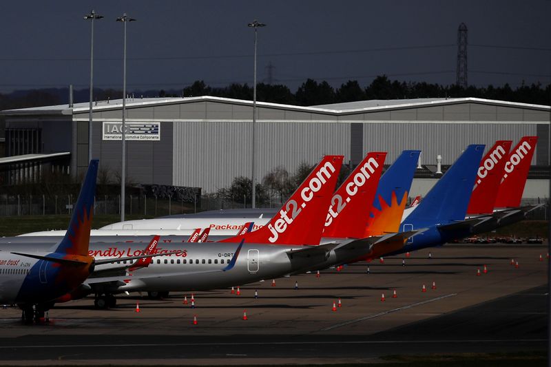 &copy; Reuters.  Jet2 planes are seen parked at Birmingham airport as the spread of the coronavirus disease (COVID-19) continues, Birmingham, Britain, March 28, 2020. REUTERS/Phil Noble
