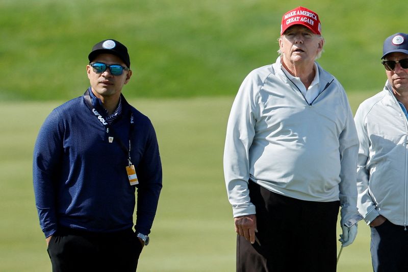 &copy; Reuters. FILE PHOTO: Walt Nauta, personal aide to former U.S. President Donald Trump who faces charges of being Trump's co-conspirator in the alleged mishandling of classified documents, walks with Trump during a LIV Golf Pro-Am golf tournament at the Trump Nation