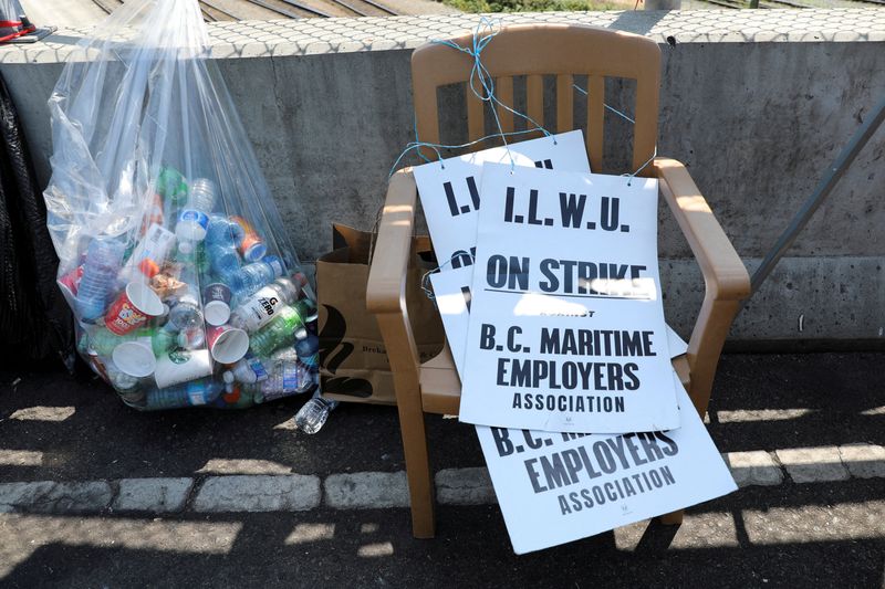 &copy; Reuters. FILE PHOTO: A view shows placards as longshoremen with the International Longshore and Warehouse Union Canada (ILWU) strike outside the Port of Vancouver's Neptune Bulk Terminals in North Vancouver, British Columbia, Canada July 5, 2023.  REUTERS/Chris He