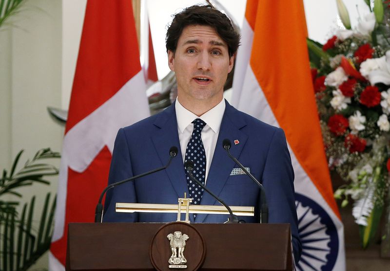 © Reuters. FILE PHOTO: Canadian Prime Minister Justin Trudeau reads a joint statement at Hyderabad House in New Delhi, India, February 23, 2018. REUTERS/Adnan Abidi/File Photo