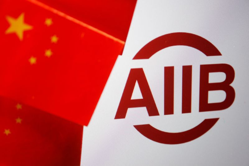 &copy; Reuters. FILE PHOTO: Flags of China are displayed next to the logo of Asian Infrastructure Investment Bank (AIIB) in this illustration picture taken June 15, 2023. REUTERS/Florence Lo/Illustration/File Photo