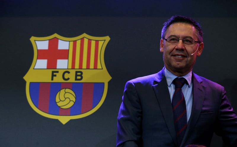 &copy; Reuters. FILE PHOTO: Barcelona's President Josep Maria Bartomeu is seen next to a FC Barcelona's logo during a charity Christmas event "Nujeen's dream" at Camp Nou stadium in Barcelona, Spain, December 14, 2017.  REUTERS/Albert Gea/File Photo