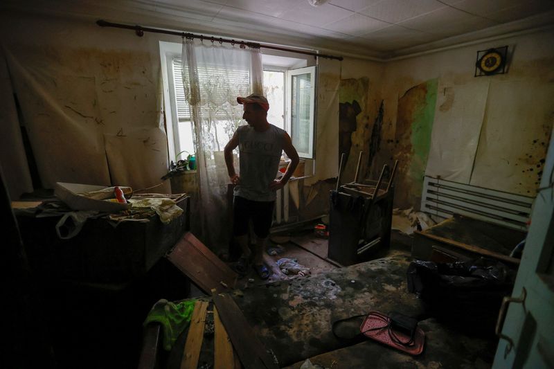 One month after Ukraine dam breach, villagers in Russian-controlled areas still live in destroyed homes