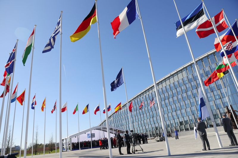 &copy; Reuters. Flags flutter during a flag-raising ceremony for Finland's accession at the NATO foreign ministers' meeting at the Alliance's headquarters in Brussels, Belgium April 4, 2023. REUTERS/Johanna Geron/Pool/File Photo