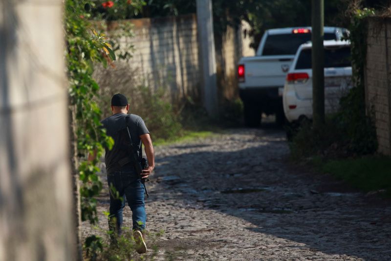 &copy; Reuters. A police officer walks near where the body of missing 59-year-old Mexican journalist Luis Martin Sanchez Iniguez, correspondent for the newspaper La Jornada, was found with signs of violence in Tepic, Nayarit state, Mexico July 08, 2023. REUTERS/Hugo Cerv