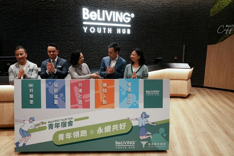 © Reuters. Guests attend the opening ceremony of BeLIVING Youth Hub, a youth hostel organized by the Hong Kong United Youth Association, in Hong Kong, China March 27, 2023. REUTERS/Lam Yik