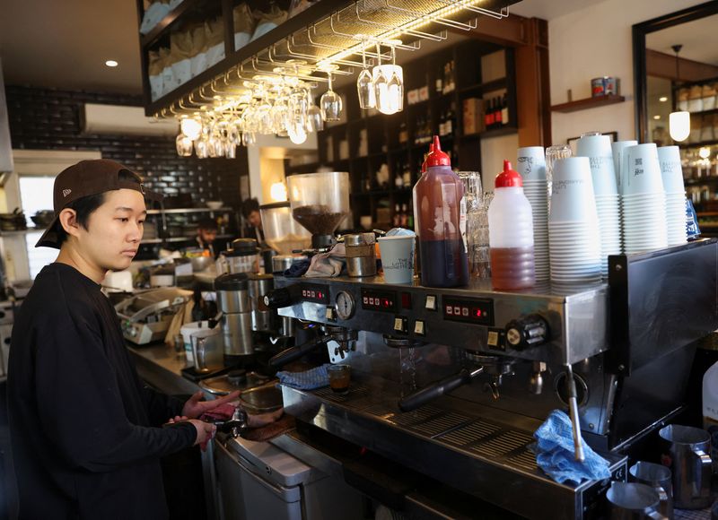 Analysis - Ground down: Australia coffee shops an early inflation casualty