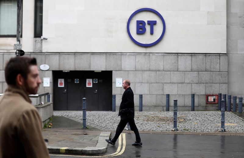 &copy; Reuters. FILE PHOTO: People walk past British Telecom (BT) headquarters in London, Britain, November 15, 2019. REUTERS/Simon Dawson