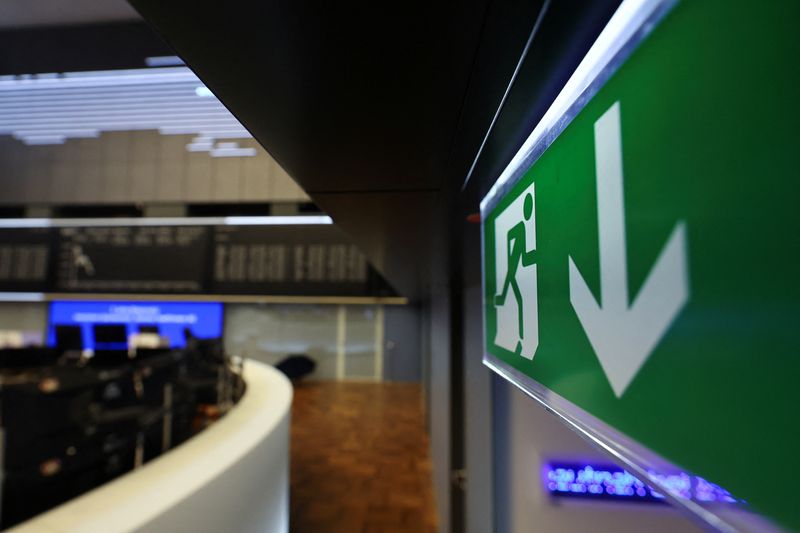 &copy; Reuters. FILE PHOTO: An emergency exit sign is seen near the DAX graph index board of the Frankfurt stock exchange  in Frankfurt, Germany, March 16, 2023. REUTERS/Kai Pfaffenbach