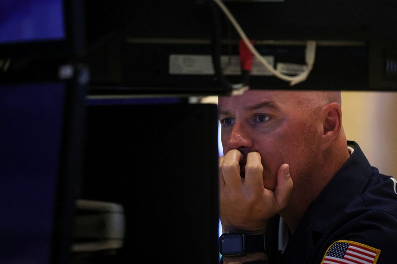&copy; Reuters. A trader works on the floor of the New York Stock Exchange (NYSE) in New York City, U.S., July 7, 2023.  REUTERS/Brendan McDermid