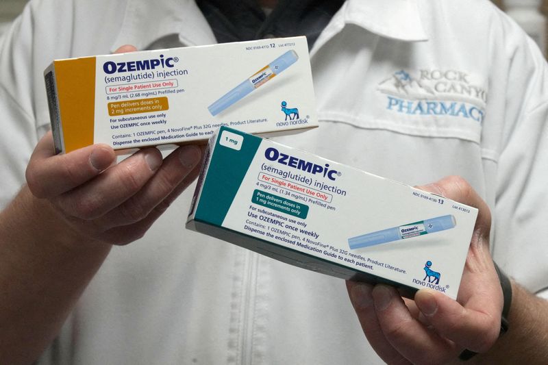 &copy; Reuters. FILE PHOTO: A pharmacist displays boxes of Ozempic, a semaglutide injection drug used for treating type 2 diabetes made by Novo Nordisk, at Rock Canyon Pharmacy in Provo, Utah, U.S. March 29, 2023. REUTERS/George Frey/File Photo