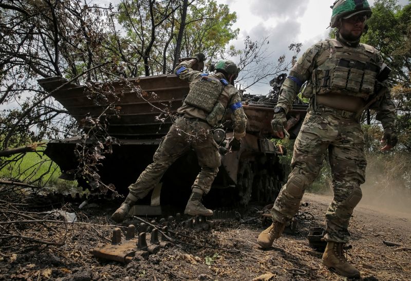 On eve of NATO meet, Ukrainian troops eye more help amid tough fighting