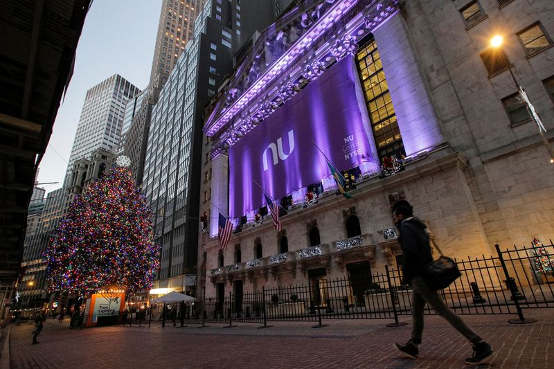 &copy; Reuters. FILE PHOTO: A banner for Nubank, the Brazilian FinTech startup, hangs on the facade at the New York Stock Exchange (NYSE) to celebrate the company's IPO in New York, U.S., December 9, 2021. REUTERS/Brendan McDermid