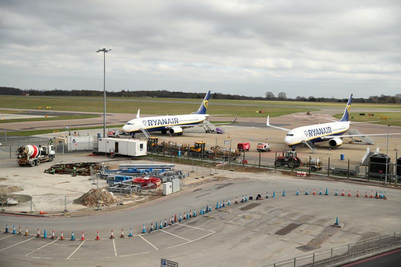 &copy; Reuters. Ryanair planes are seen at Luton Airport as the number of coronavirus cases grow around the world  London, Britain, March 17, 2020. REUTERS/Peter Cziborra/File Photo