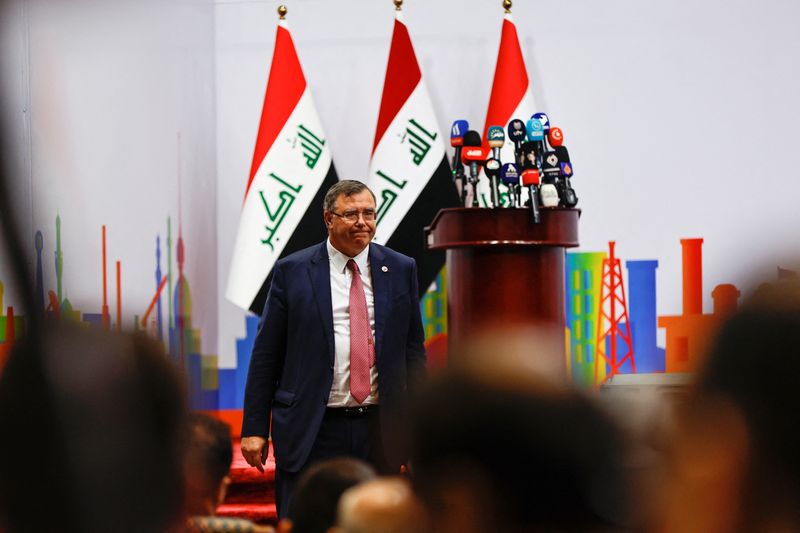 &copy; Reuters. Patrick Pouyanne, Chairman and CEO of TotalEnergies, walks at a signing ceremony of the Gas Growth Integrated Project (GGIP) in Baghdad, Iraq, July 10, 2023. REUTERS/Thaier Al-Sudani