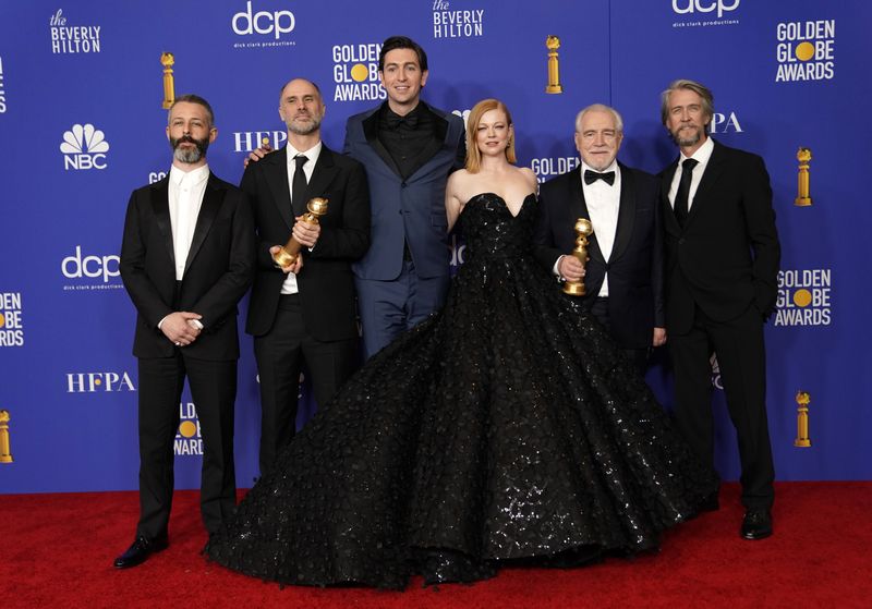 &copy; Reuters. FILE PHOTO: 77th Golden Globe Awards - Photo Room - Beverly Hills, California, U.S., January 5, 2020 - The cast of "Succession" poses backstage with their Best Television Series - Drama award. REUTERS/Mike Blake/File Photo