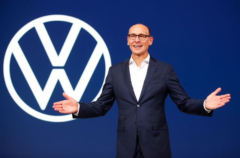&copy; Reuters. FILE PHOTO-Ralf Brandstaetter, CEO of the Volkswagen Passenger Cars brand gestures in front of the revised logo of German carmaker Volkswagen AG during a preview of the world's biggest automaker at the international Frankfurt Motor Show IAA in Frankfurt, 
