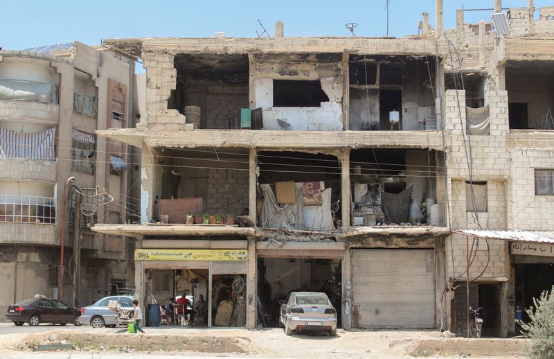 &copy; Reuters. Prédio danificado em Douma
 19/6/2023  REUTERS/Firas Makdesi