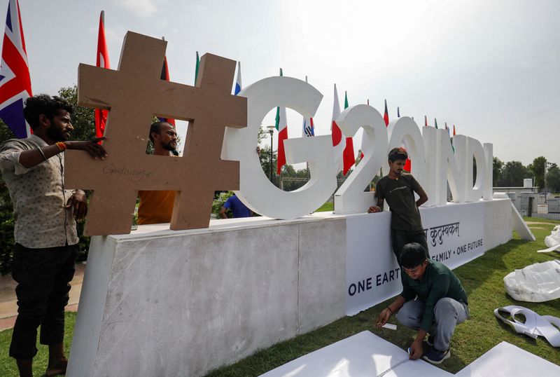 &copy; Reuters. FILE PHOTO: Workers work near the venue of G20 Finance Ministers and Central Bank Governors meeting at Gandhinagar in Gujarat, India July 13, 2023. REUTERS/Amit Dave