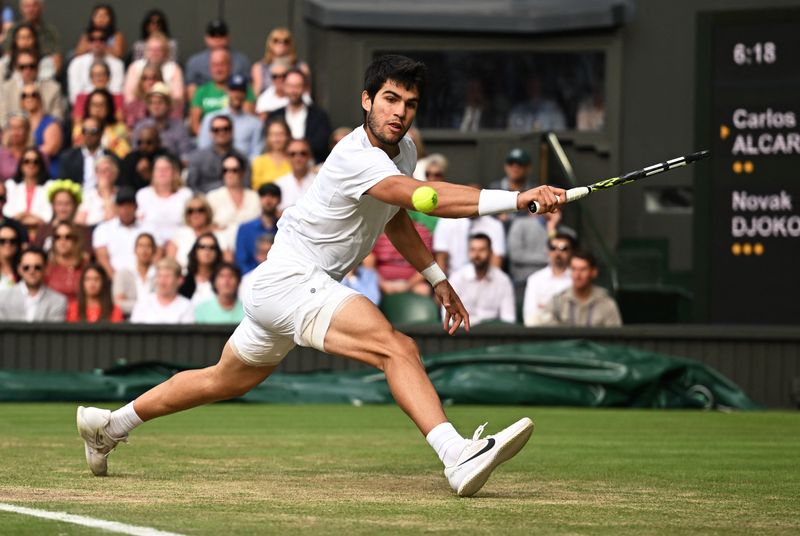 &copy; Reuters. Tennis - Wimbledon - All England Lawn Tennis and Croquet Club, London, Britain - July 16, 2023 Spain's Carlos Alcaraz in action during his final match against Serbia's Novak Djokovic REUTERS/Dylan Martinez