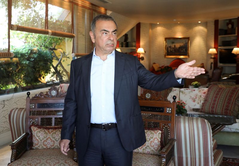 &copy; Reuters. FILE PHOTO: Fugitive former car executive Carlos Ghosn, gestures before an interview with Reuters in Beirut, Lebanon June 14, 2021. REUTERS/Mohamed Azakir/