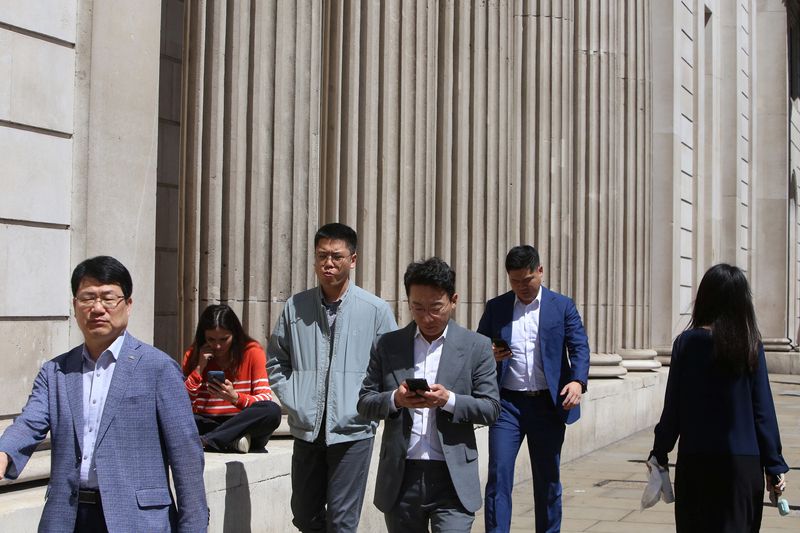 &copy; Reuters. People walk past the Bank of England in London's financial district, as Britain struggles with the highest inflation rate among the world's big rich economies, London, Britain, 17 July 2023. REUTERS/Rachel Adams