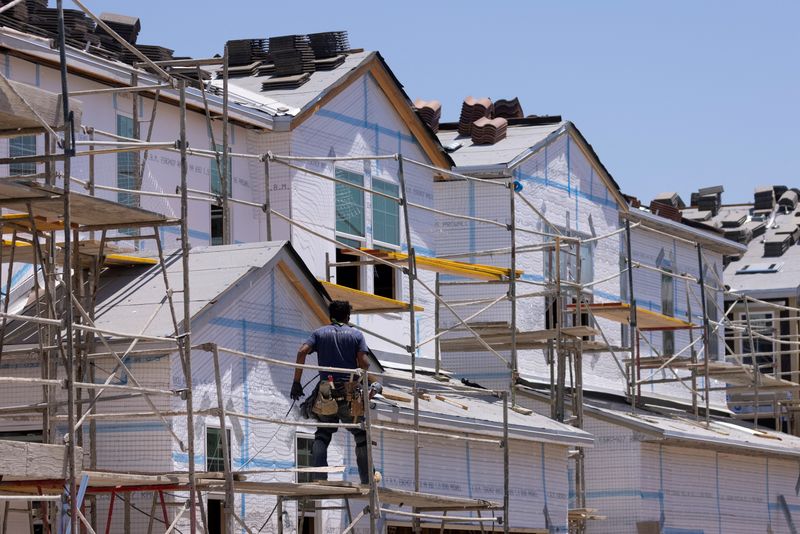 &copy; Reuters. FILE PHOTO: Residential single family homes construction by KB Home are shown under construction in the community of Valley Center, California, U.S. June 3, 2021.   REUTERS/Mike Blake/File Photo