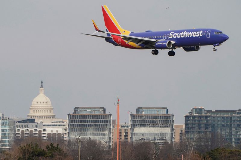 &copy; Reuters. FILE PHOTO: A Southwest Airlines aircraft flies past the U.S. Capitol before landing at Reagan National Airport in Arlington, Virginia, U.S., January 24, 2022.   REUTERS/Joshua Roberts/File Photo