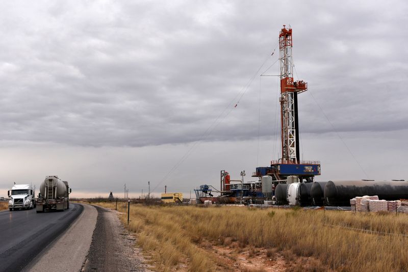 &copy; Reuters. FILE PHOTO: A drilling rig operates in the Permian Basin oil and natural gas production area in Lea County, New Mexico, U.S., February 10, 2019. Picture taken February 10, 2019.   REUTERS/Nick Oxford/File Photo