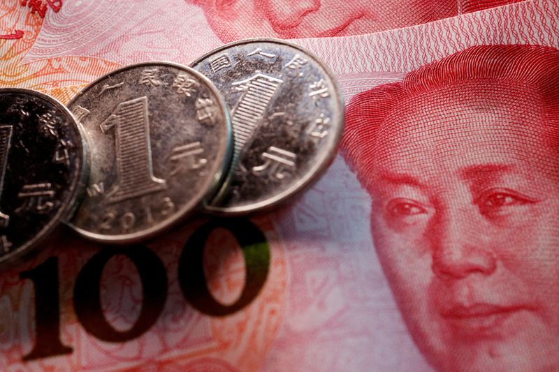 Exclusive-China's state banks seen selling dollars offshore to slow yuan declines - sources