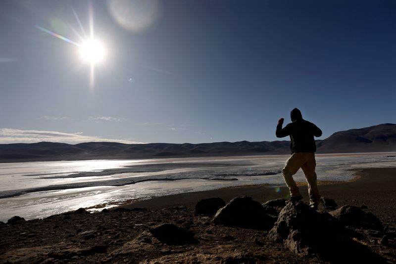 &copy; Reuters. Reuters journalist Alexander Villegas walks the area of Pujsa salt flat at Los Flamencos National Reserve, in Antofagasta region, Chile, May 5, 2023. REUTERS/Ivan Alvarado