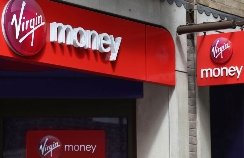 &copy; Reuters. FILE PHOTO: Signs are displayed on a Virgin Money store in London, Britain April 30, 2016. REUTERS/Neil Hall/File Photo