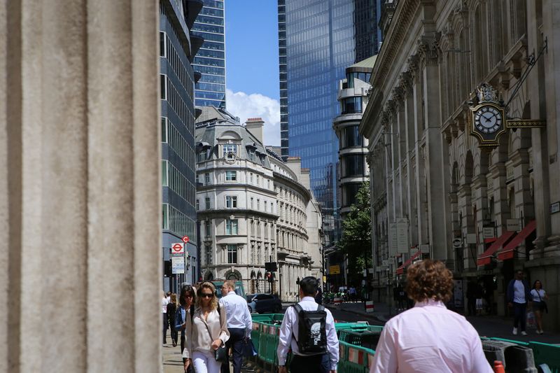 &copy; Reuters. People walk past the Bank of England in London's financial district, as Britain struggles with the highest inflation rate among the world's big rich economies, in London, Britain July 17, 2023. REUTERS/Rachel Adams