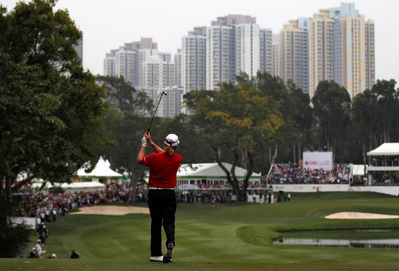 © Reuters. FILE PHOTO: Miguel Angel Jimenez from Spain hits a shot on the 18th fairway during the final day of the Hong Kong Open Championship at the Hong Kong Golf Club in Hong Kong, China November 18, 2012. REUTERS/Tyrone Siu