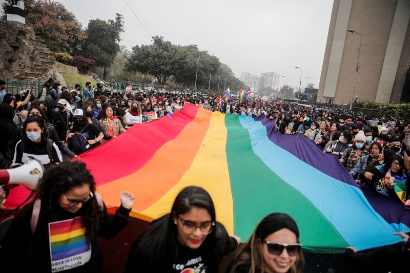 &copy; Reuters. FILE PHOTO: Participants attend the LGBTQ+ Pride Parade, after it being cancelled for two years due to the coronavirus disease (COVID-19) pandemic, in Lima, Peru June 25, 2022. REUTERS/Sebastian Castaneda/File Photo