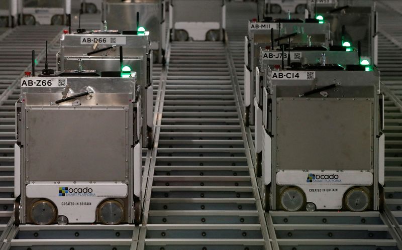 &copy; Reuters. FILE PHOTO: Robots are seen inside the Ocado warehouse in Erith, London, Britain, October 13, 2021. Picture taken October 13, 2021. REUTERS/Paul Childs/File Photo