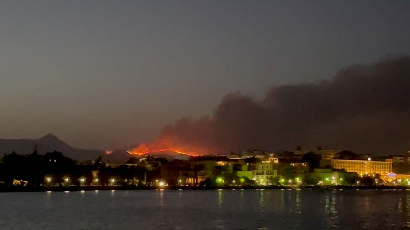 &copy; Reuters. Smoke rises from a wildfire on Corfu Island, Greece, July 23, 2023 in this still image obtained from social media video.   Julia Dzhyzhevska/via REUTERS  