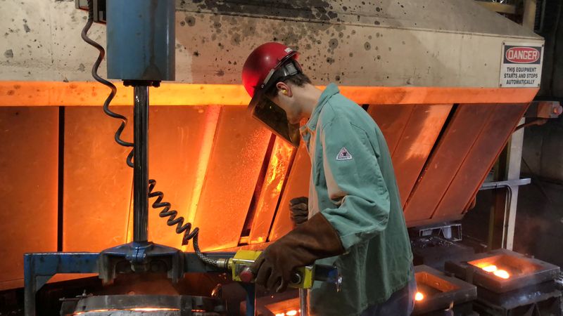 &copy; Reuters. FILE PHOTO: A worker pours hot metal at the Kirsh Foundry in Beaver Dam, Wisconsin, U.S., April 12, 2018. Picture taken April 12, 2018.  REUTERS/Timothy Aeppel/File Photo
