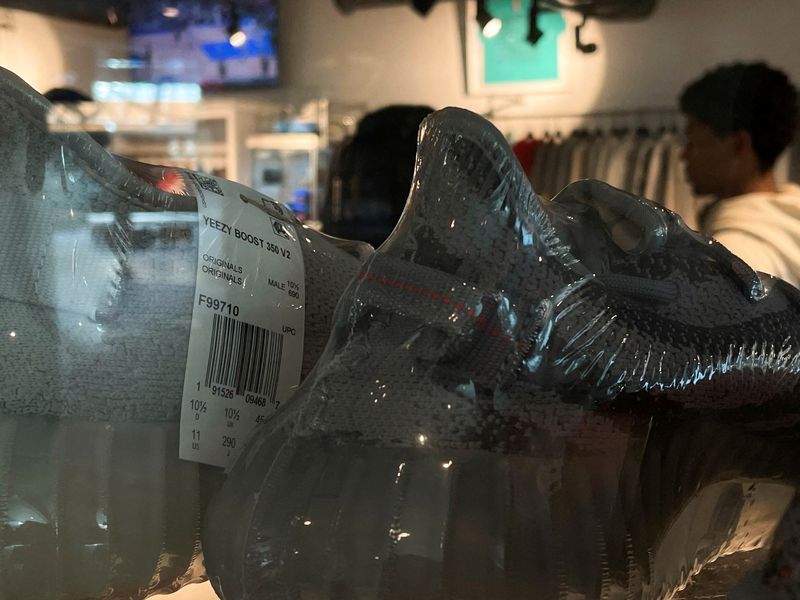 &copy; Reuters. FILE PHOTO: A pair of Adidas Yeezy shoes are seen in a store on the day Adidas terminated its partnership with the American rapper and designer Kanye West, now known as Ye, in Garden City, New York, U.S., October 25, 2022. REUTERS/Shannon Stapleton/File P