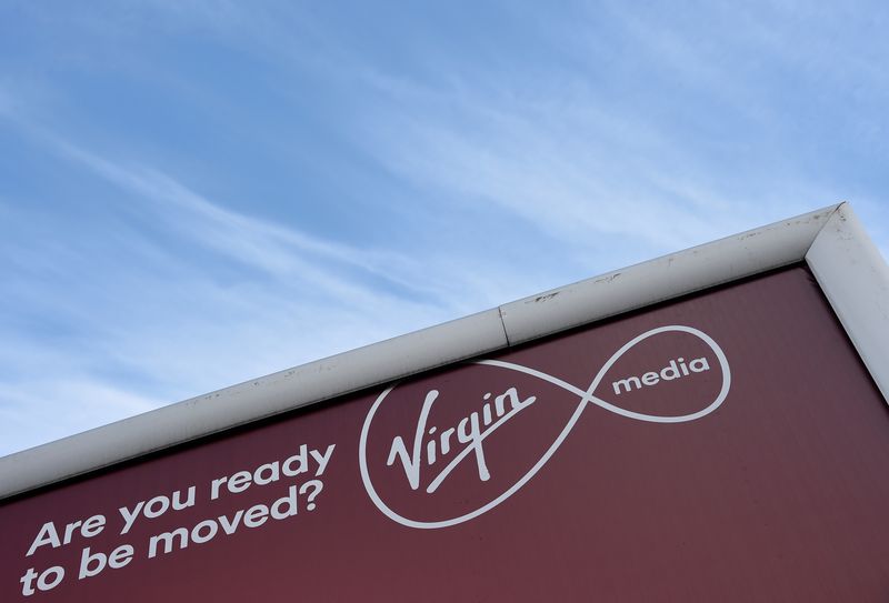 &copy; Reuters. FILE PHOTO: A billboard advertising Virgin media fibre broadband is seen in London, Britain, March 30, 2016. REUTERS/Toby Melville/File Photo