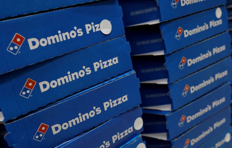 &copy; Reuters. FILE PHOTO: Domino's pizza boxes are pictured inside a restaurant in Noida, India, July 4, 2023. REUTERS/Adnan Abidi/File Photo